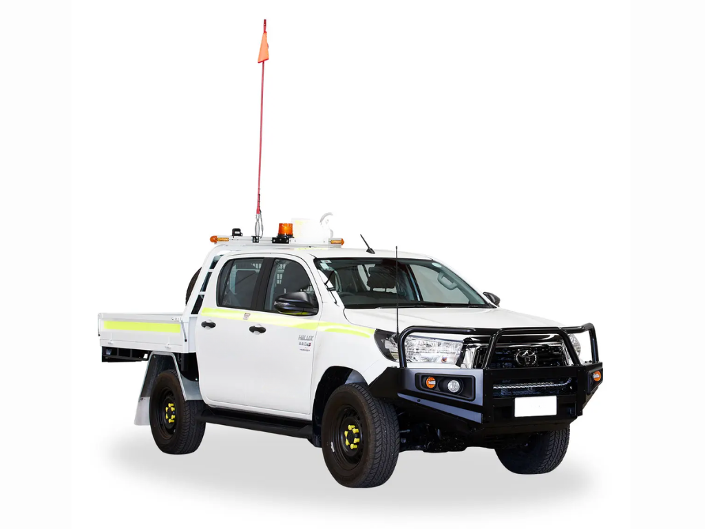 mine spec ute with red flag